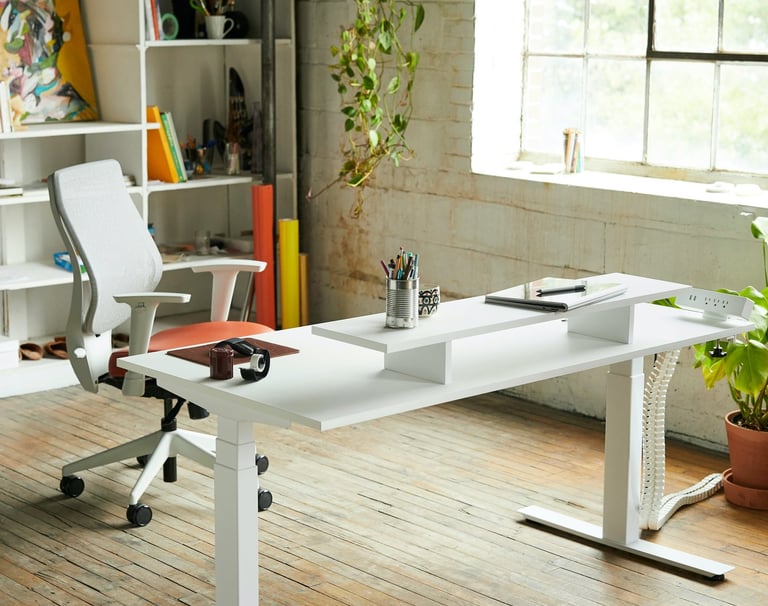a ergonomic appropriate height desk with a chair 