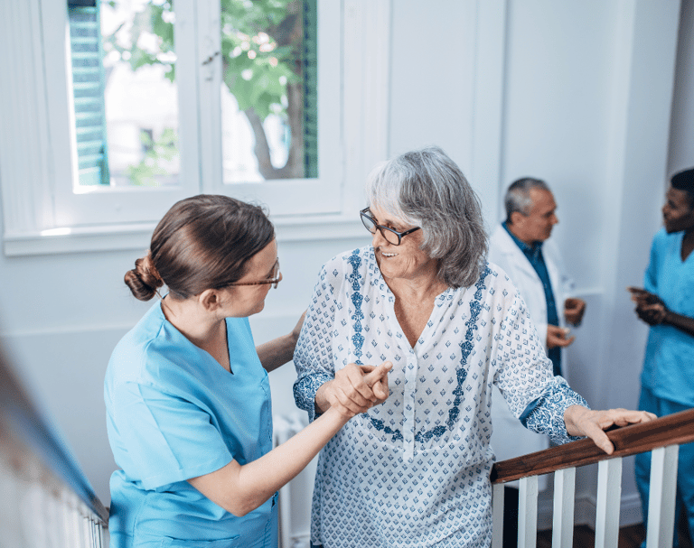 a nurse and a nurse in scrubs