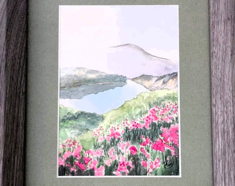 a picture of a painting of a mountain and flowers