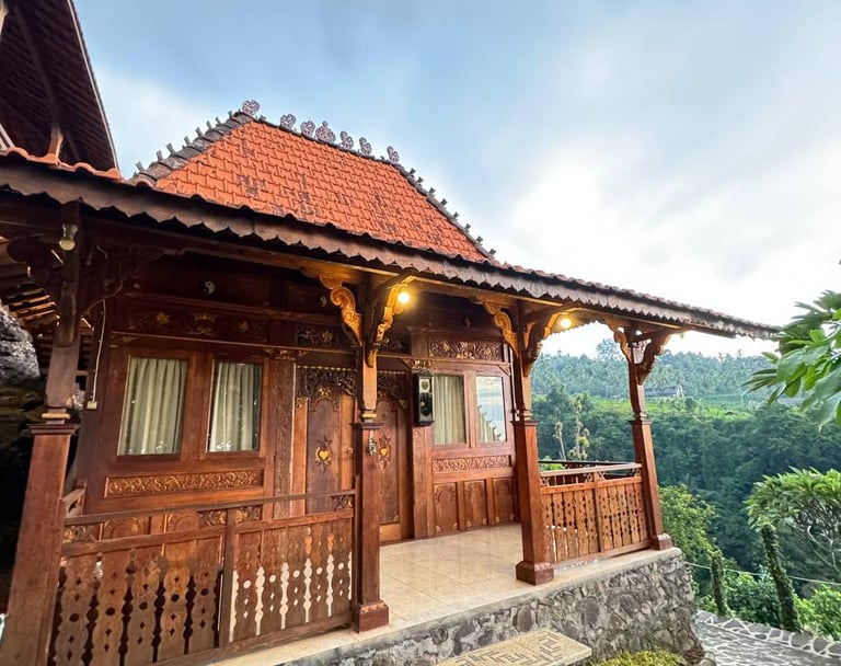Antique Joglo teak pavilion exterior showcasing traditional Indonesian architecture crafted from reclaimed teak wood