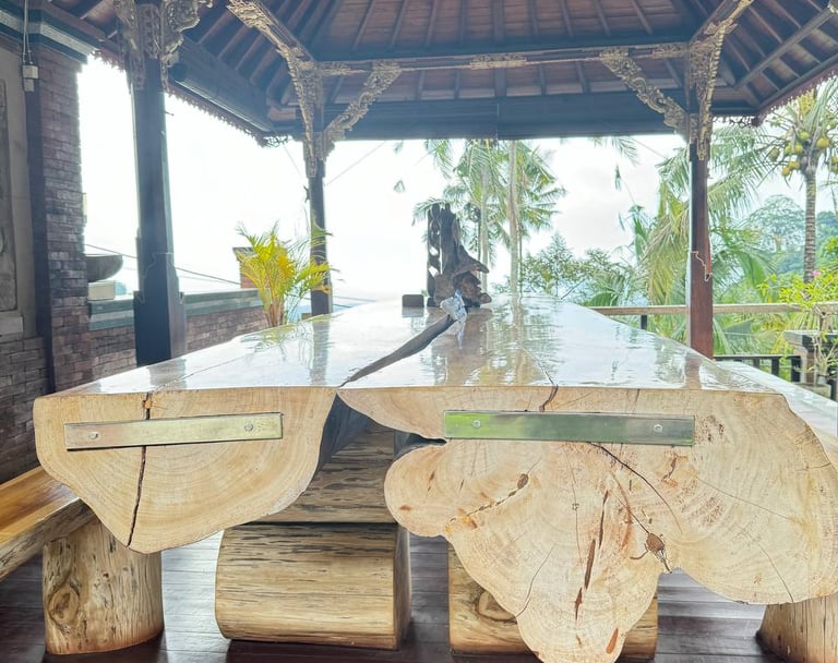 Outdoor Joglo living space built with antique teak wood offering natural ventilation and elegant tropical ambiance