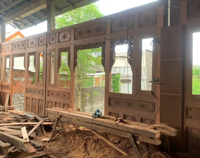 Traditional Joglo frame construction using solid antique teak beams prepared for international export projects