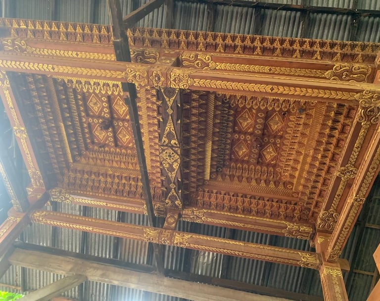 Intricate Joglo roof detail made from antique teak wood highlighting traditional Indonesian craftsmanship techniques