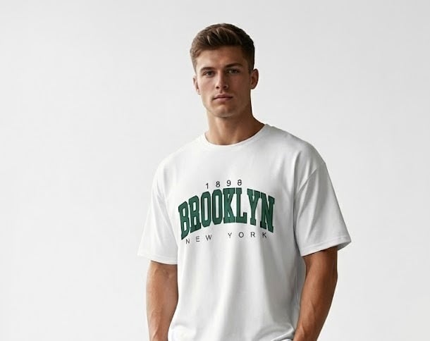 a man in a white shirt and black pants