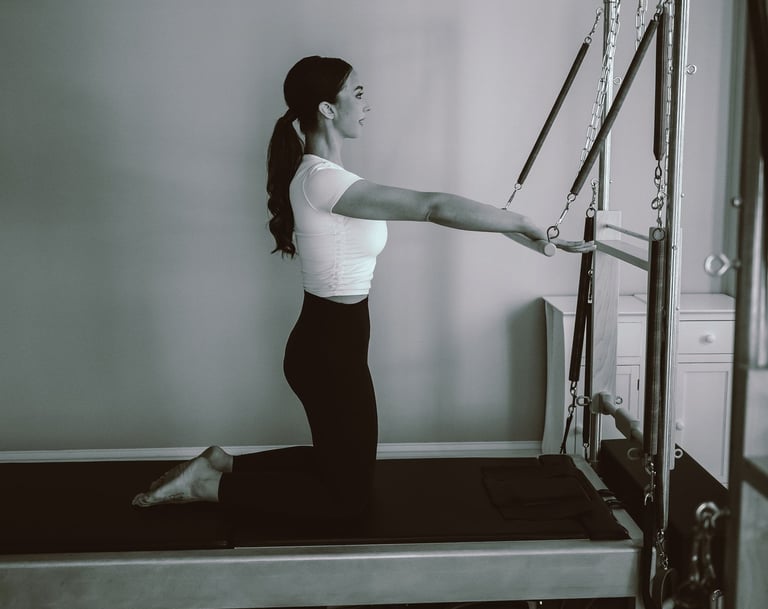 27 Pilates owner Tina Blondin photo on a reformer
