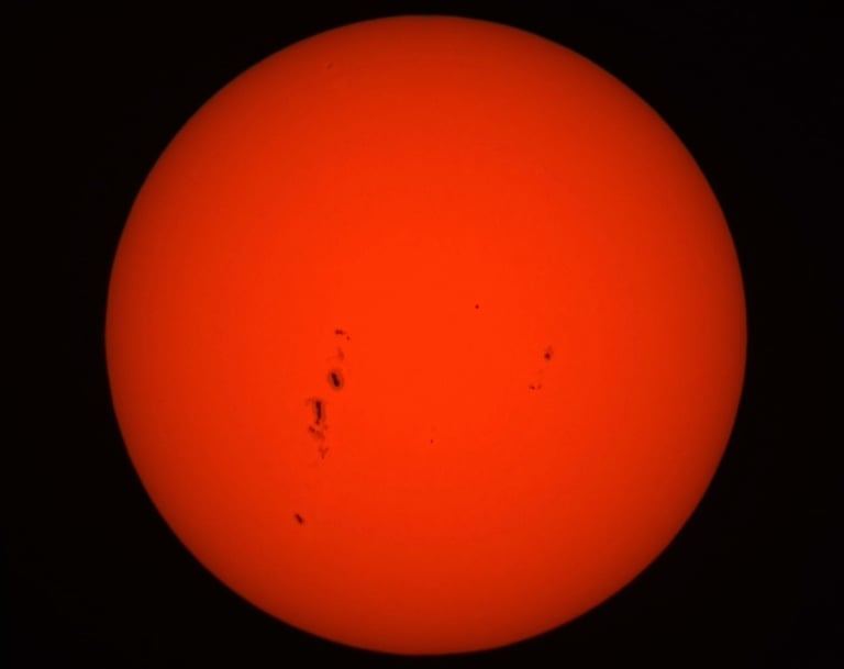 the sun morning of the 12/7/25, the dark spots are called sun spots they are cooler than the sun