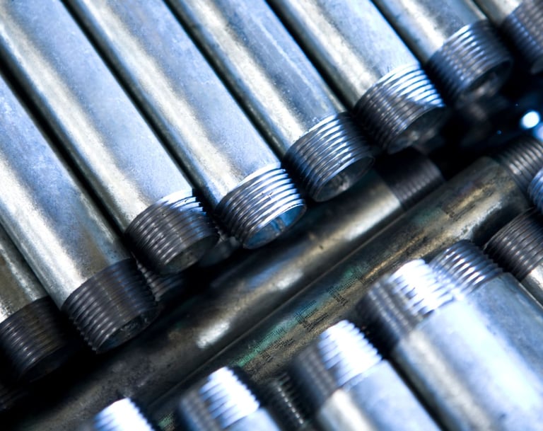 Close-up of high-grade galvanized iron (G.I.) nipples with clean threads
