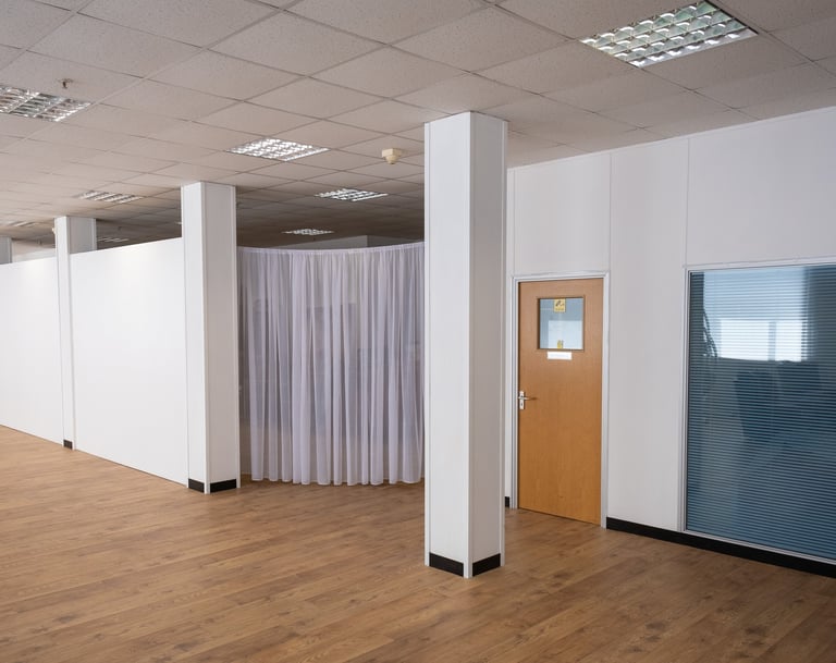 The White Room door to the green room and Prop room curtain at Atlas Studios.