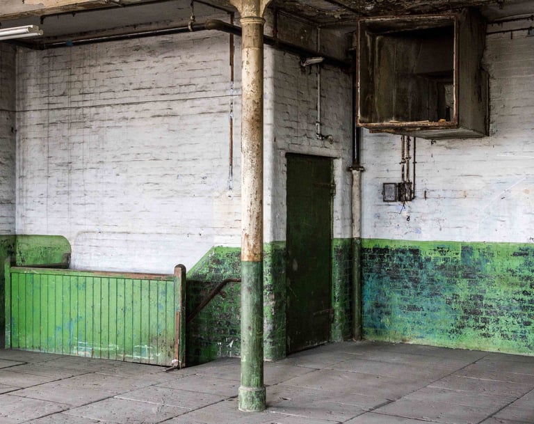 Industrial peeling paint, Stone floor, old metal door in the Stone room at Atlas Studios