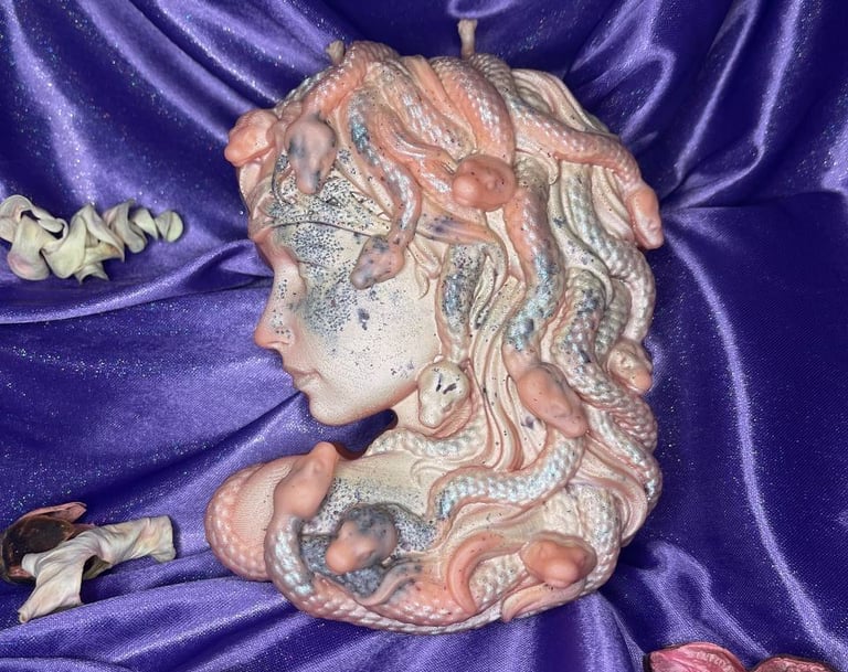 a statue of a woman with a head of snake hair