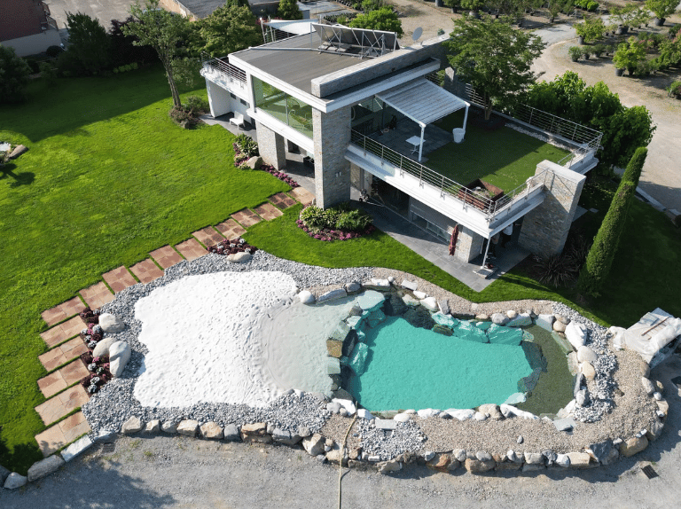 realizzazione piscina naturale rocks design su villa a sabaudia edil leonardo