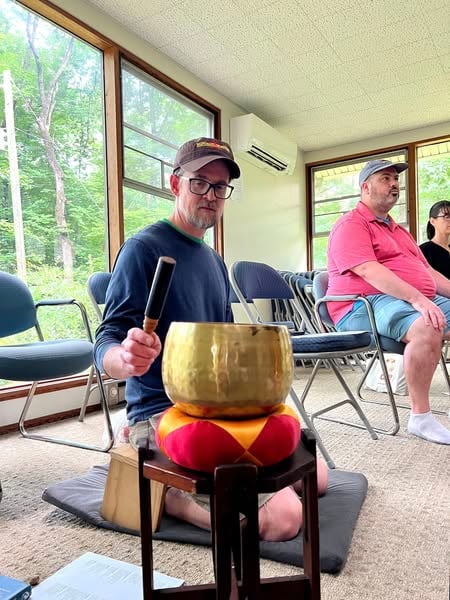 image of sangha ringing meditation bell