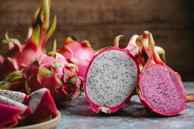 Whole and Sliced Dragon Fruit Being Prepared for a Keto Diet
