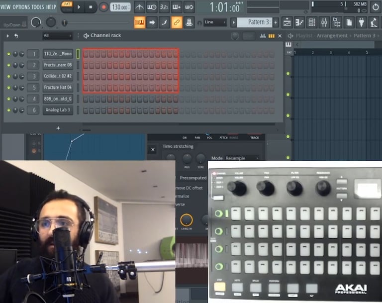 a man in a recording studio with a microphone and a keyboard doing a tutorial on akai fire in arabic