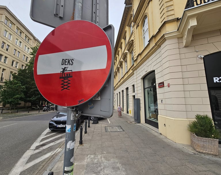 a red and white sign with a red and white stripe