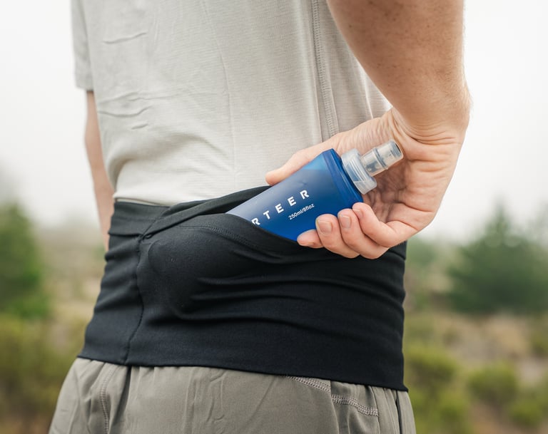 Sporteer running belt product photo with water bottle by BrandNests business marketing team.