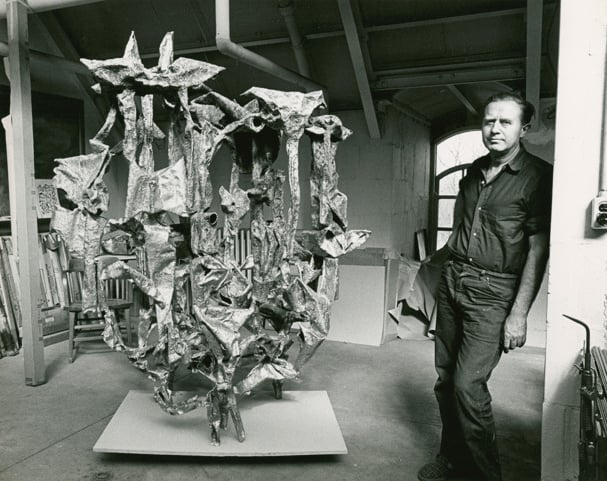 Sculptor Ibram Lassaw in 1963 with his sculpture titled Equinox. Photo taken at Duke University.