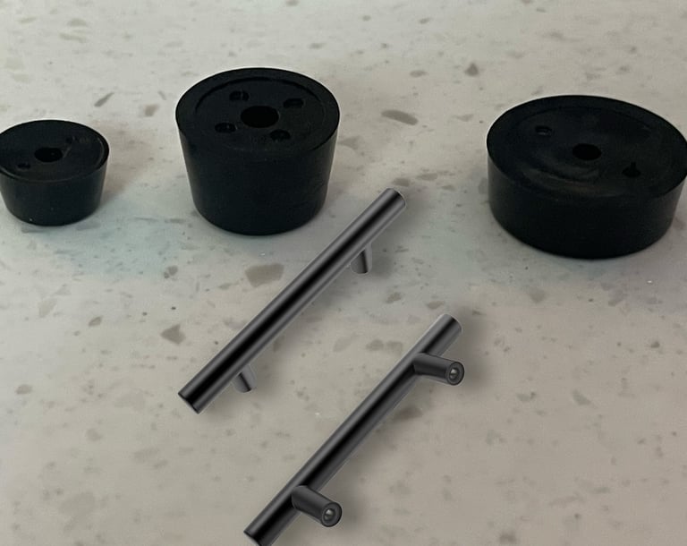 a table with a bunch of black plastic knobs