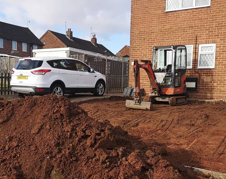 Mini digger in use for drainage and trenching work in West Bromwich area
