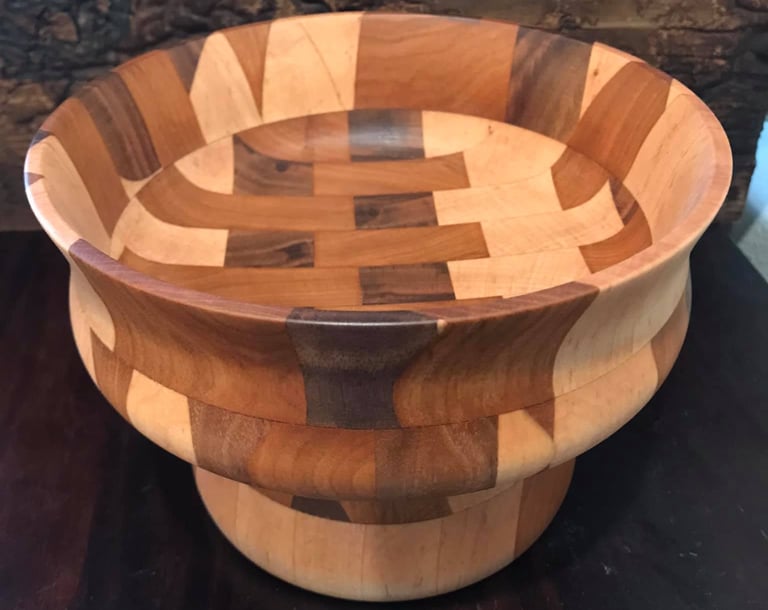 Custom wood bowl created from several recycled wood cutting boards.