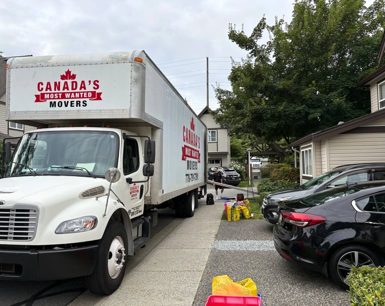 Canada’s Most Wanted Movers truck loading for a townhouse move in the Maple Ridge