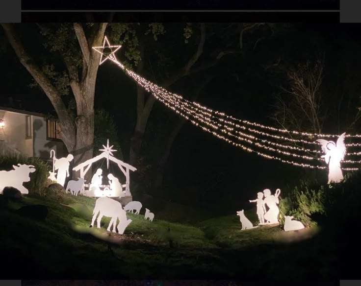 spotlights and string lighting for outdoor Nativity