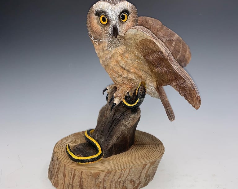 a bird perched on a tree stump