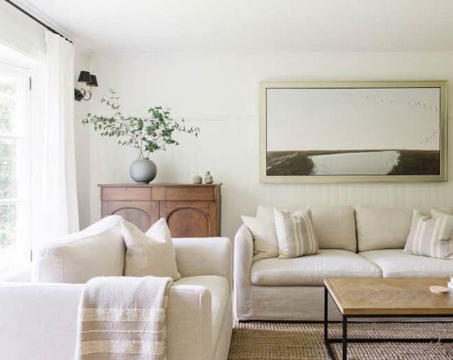 a living room with a couch and a table