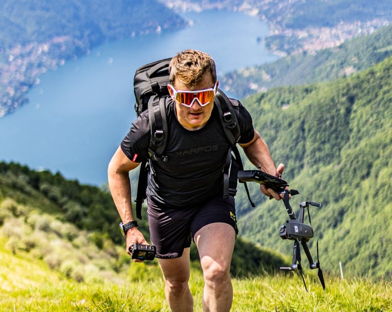 a man with a backpack on a mountain trail