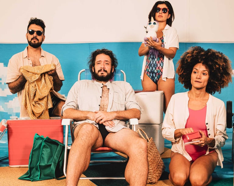 a group of people sitting on a beach