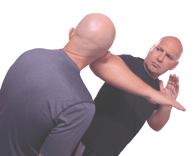 a man in a black shirt is doing a krav maga move