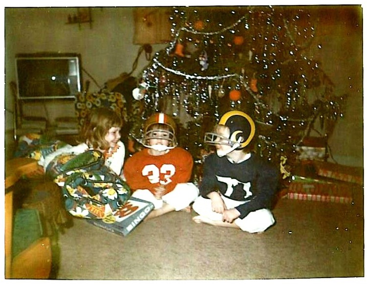 Christmas morning perhaps 1975 or '76, Karen, Derek and me. Derek in SF 49ers gear and me LA Rams