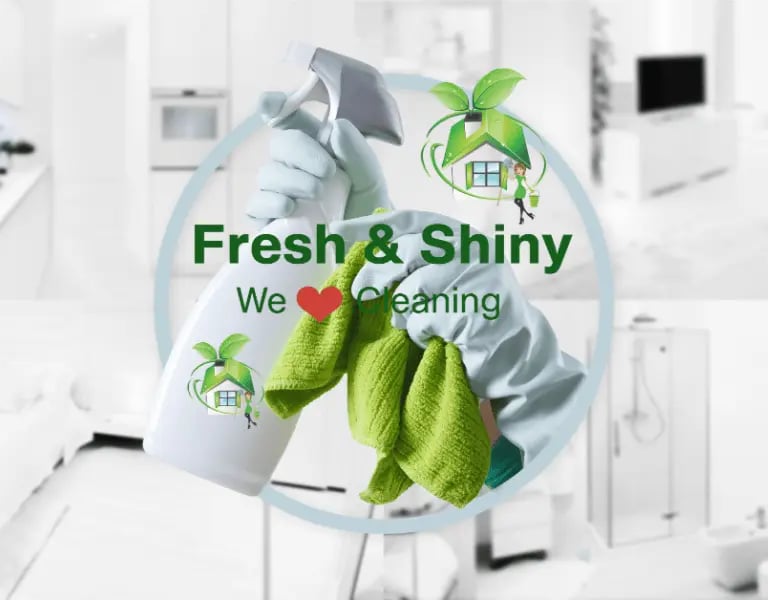 a person cleaning a kitchen with a cleaning cloth