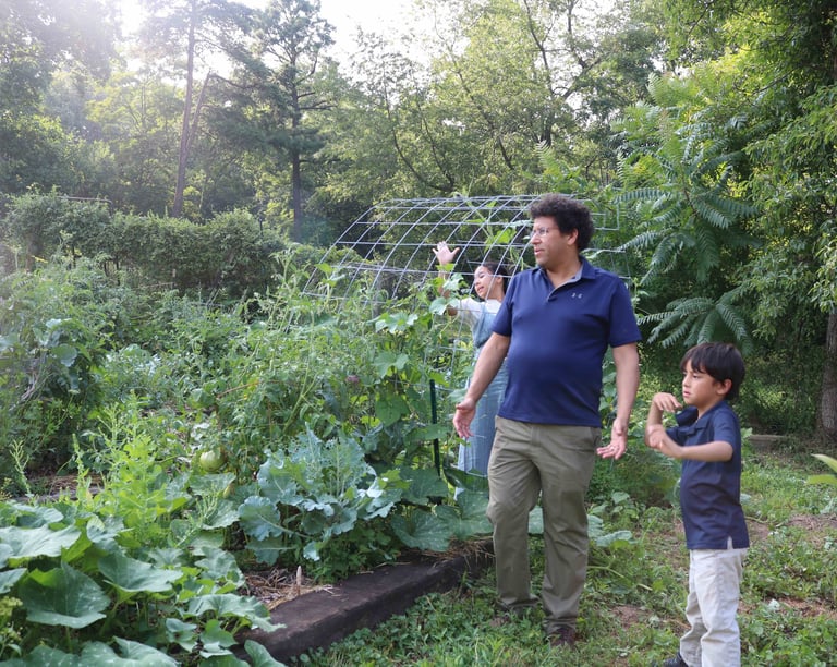 Dave and the kids in the garden. 