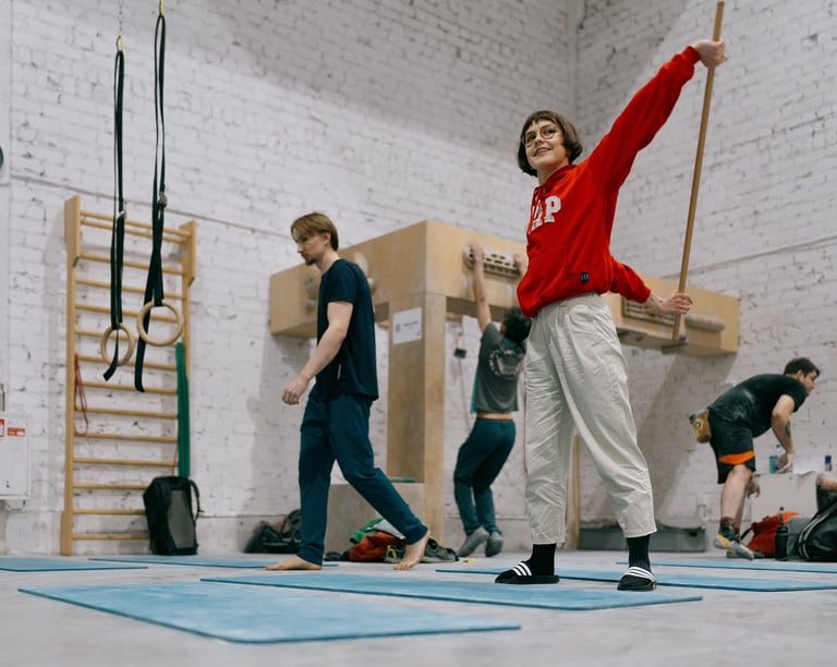 a woman in a red sweater is stretching