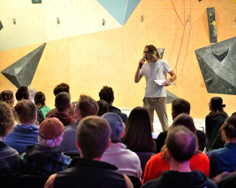 a man standing in front of a crowd of people