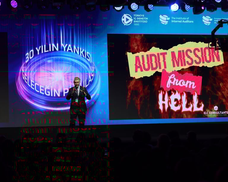 Andy Kovacs of ELC Consultants speaking on stage at audit conference about -Audit Mission from Hell