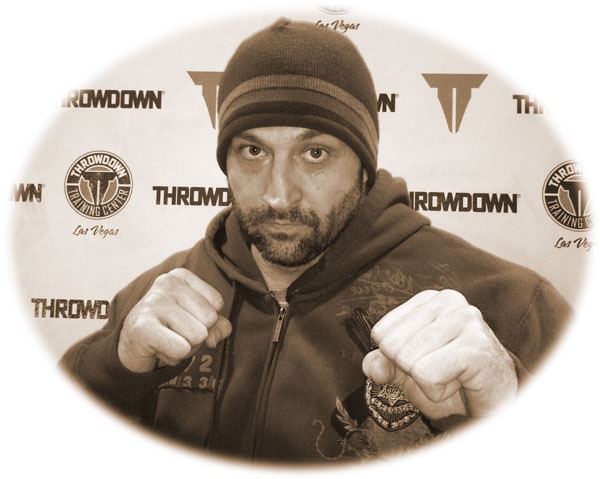 a man with a beard and a hat on a white background