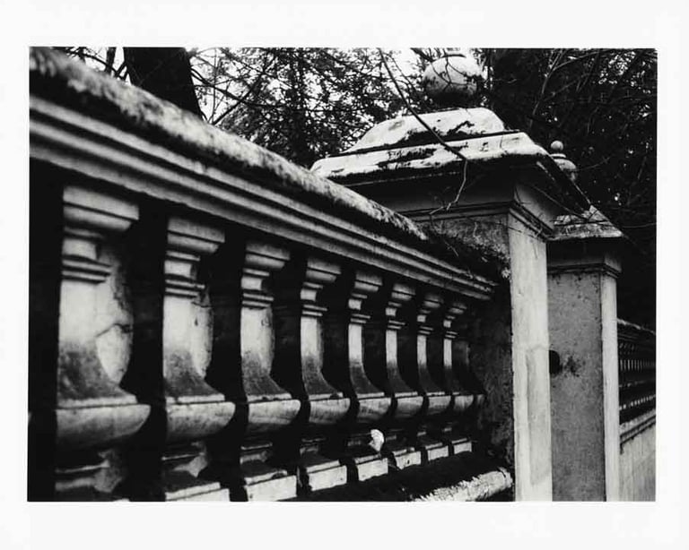 A concrete fence covered with a snow in London