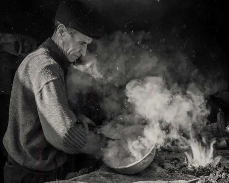 A Peruvian man cooking in a seafood restaurant