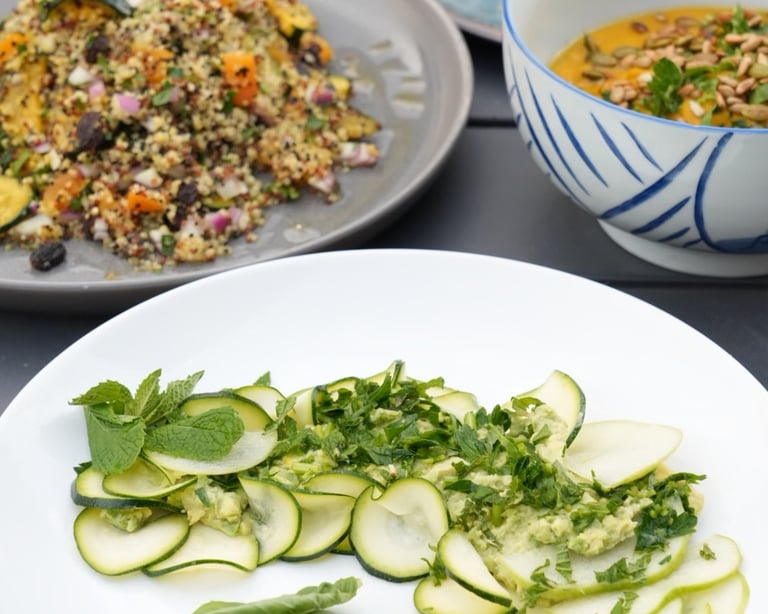 a table with a variety of vegetables
