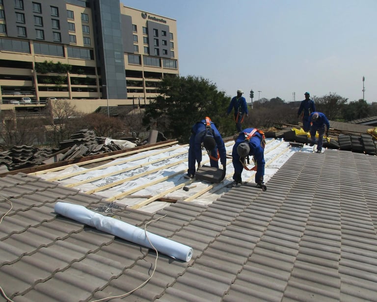 Laying roof tiles for roof installation Project, Environmental Pro Construction