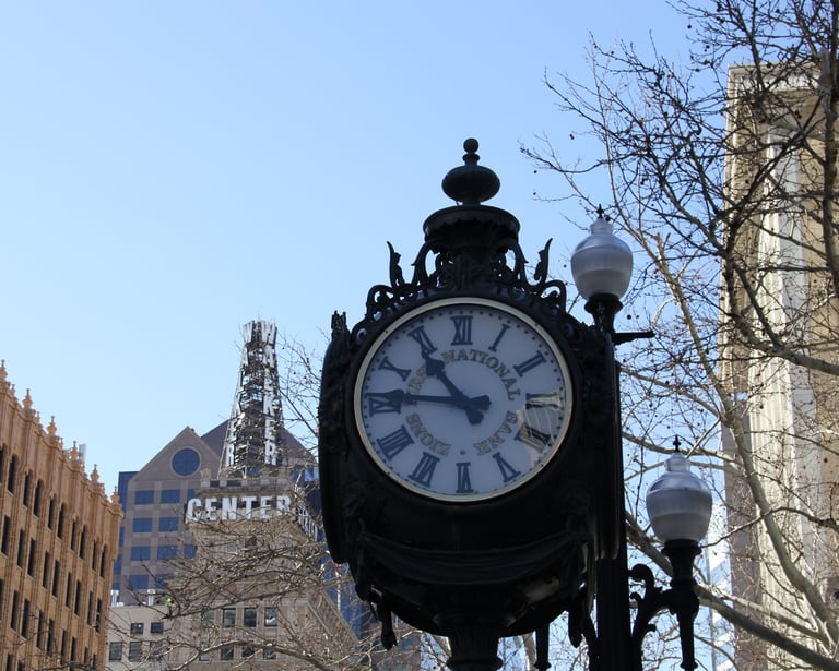 A Zion First National Bank clock in front of the Walker Center in downtown Salt Lake City