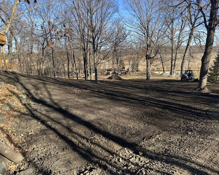 dirt site grading of residential backyard