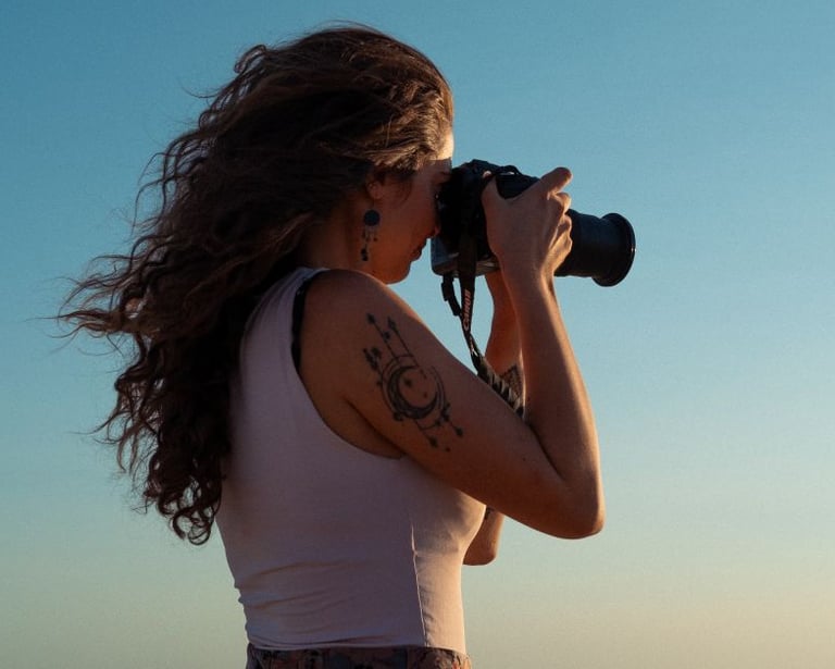 a woman taking a picture with a camera