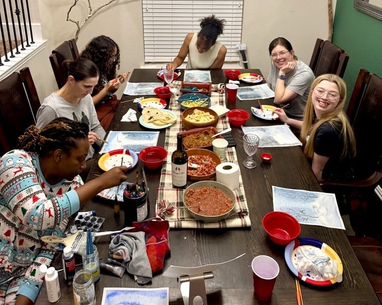 Women enjoying a Ladies’ Night watercolor painting class at Kelley’s Neighborhood Art 
