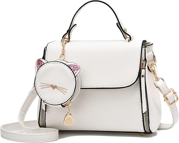 White vegan leather handbag with gold hardware and detachable kitty coin purse.