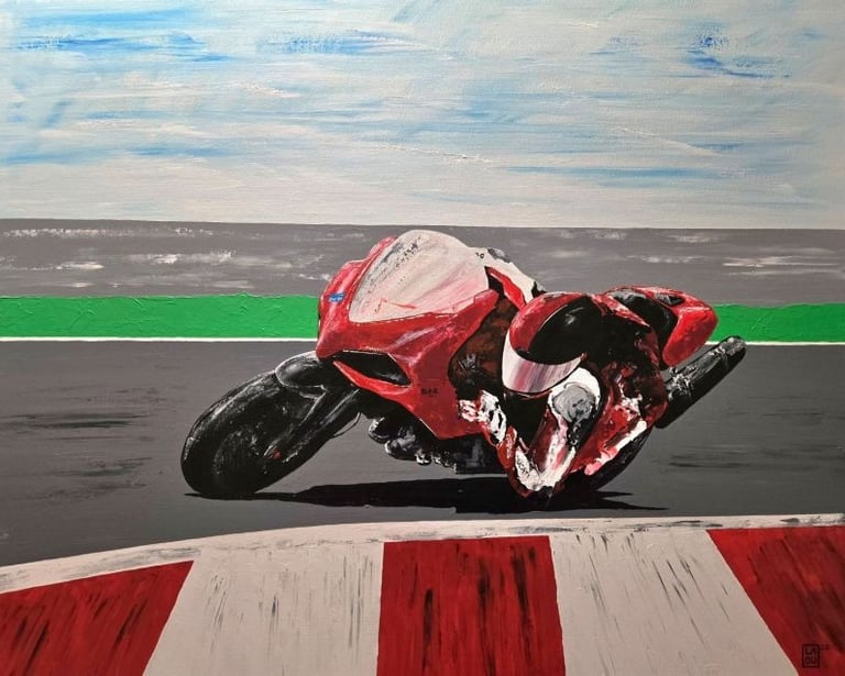 a painting of a motorcycle rider on a track
