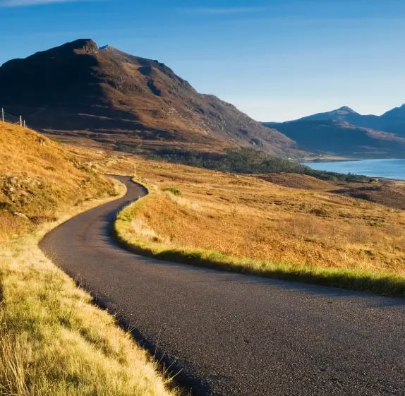 Single track road through the scottish hills 