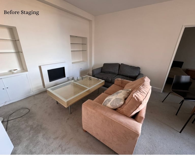 a living room with 2 sofas and oversized coffee table